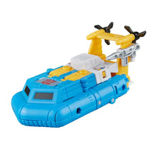Blue and white robot action figure on a yellow-and-gray vehicle with twin cannons