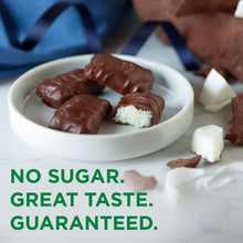 Sugar-free coconut chocolate candy pieces in a bowl with shredded coconut