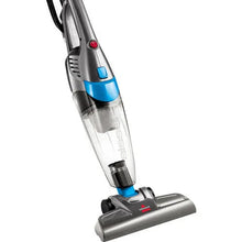 BISSELL handheld vacuum with clear dust cup and wide floor brush head