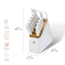 White knife block set with white-handled stainless knives in a white block and wooden top