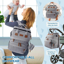 Grey diaper backpack with handles, side pockets, and stroller-hanging straps.