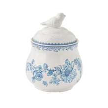White stoneware lidded sugar bowl with blue floral band and bird finial