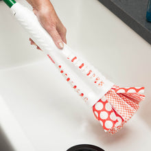 Microfiber mop head with red-and-white patterned cloth attached to handle