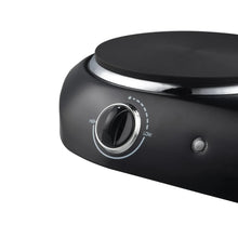 Black electric cooktop showing coil burner and temperature control dial