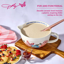 Ceramic batter bowl with floral butterfly print, white exterior and visible interior