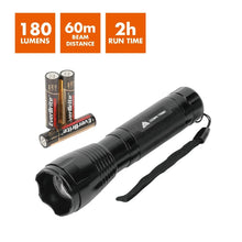 Black camping flashlight with textured grip, lanyard, and included batteries