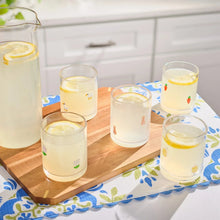 Charm drinking glasses on a tray with carrot and egg motifs