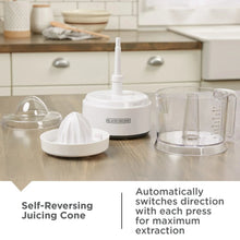 BLACK+DECKER manual citrus juicer set: white cone, clear pitcher, and measuring container