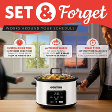 Programmable slow cooker on table with touchscreen display and handles, lid open