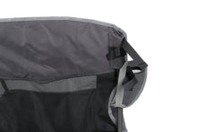 Camp chair side panel close-up with mesh and fabric pockets, dark gray