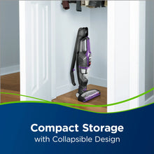 Purple cordless stick vacuum with foldable handle, upright for compact storage