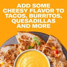 Queso dip cup with cheese-covered tacos and tortilla chips