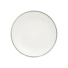 White coupe dinner plate with dark rim