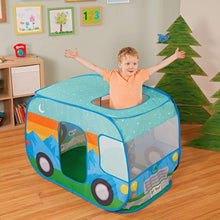 Blue camper van fabric pop-up tent in a room with a child popping up