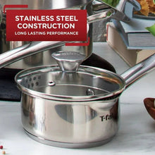 Stainless steel sauce pan with straining lid insert and long handle