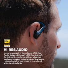Black earhook true wireless earbuds worn in-ear on a person