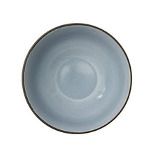 Denim blue stoneware cereal bowl top view with circular well and dark rim