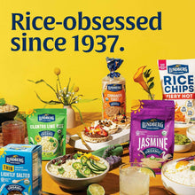 Assorted Lundberg rice packages, bowls, and ingredients on a tabletop