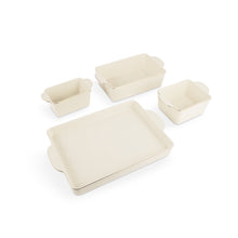 Cream ceramic nesting bakeware set with four rectangular baking dishes