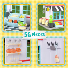 General store dollhouse playset with storefront windows, awning, and accessory pieces