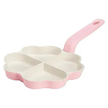 Heart-shaped fry pan with four nonstick sections and pink handle