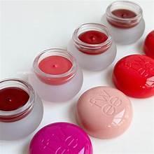 Lip & cheek pudding pots with clear lids, pink and red tones