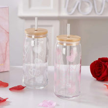 Pair of clear glass sipper jars with bamboo lids, pink heart accents, tall straws