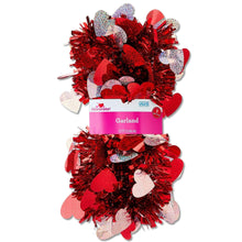 Red heart tinsel garland with layered heart confetti and gift tag label