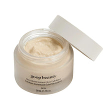 goopbeauty microderm exfoliator jar with pale cream inside and white lid.