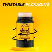 Twistable hair wax stick with white top cap, black base, and yellow label