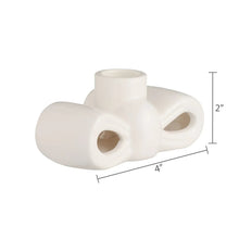 White stoneware bow taper candle holder, 2 in height and 4 in length