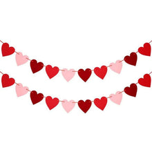 Felt heart Valentine garland banner with red and pink hearts on a string