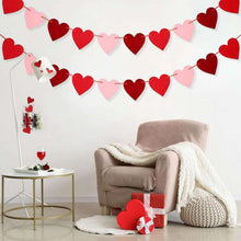 Valentine heart garland banner with red and pink felt hearts on a hanging string