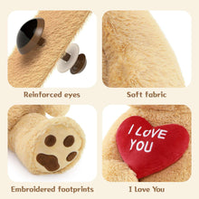 Light brown teddy bear plush details: reinforced eyes, soft fabric, stitched footprints, red heart