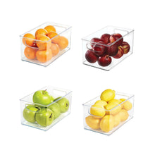Clear plastic fridge/pantry organizer bin with orange fruit pieces inside