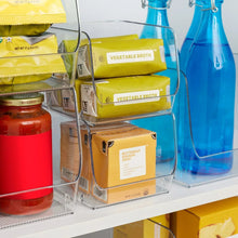 Stacking open-front pantry bins with clear plastic sides for storing pantry items