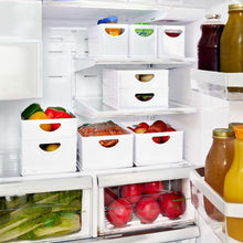 White stacking refrigerator storage bins with oval handgrips and open fronts