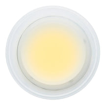 White candle-style Bluetooth speaker with warm light glow, circular top and base