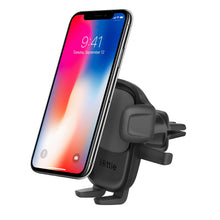 Air vent phone mount with gray cradle and black vent clips