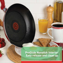 Red nonstick skillet with interior ridged surface and handle