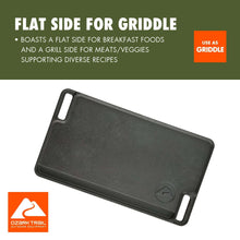 Black cast iron reversible grill griddle plate with flat cooking surface and handles