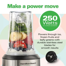Single-serve blender with clear jar holding ice and fruit, stainless blades