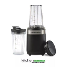 Black single-serve blender with clear cups and measurement markings