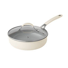 Cream ceramic pot with domed glass lid and long cream handle