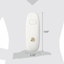 White hands-free electric can opener with gold B logo and compact size