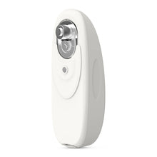 White hands-free electric can opener with top dial and push button