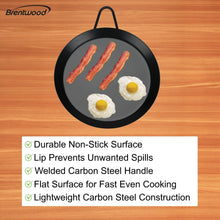 Round black comal griddle with loop handle and raised rim for preventing spills