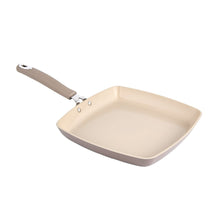 Square ceramic nonstick griddle with beige pan and angled side handle
