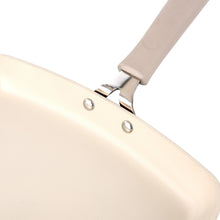 Ceramic nonstick griddle rim and handle connection with metal rivets