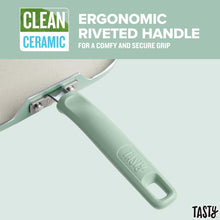 Nonstick griddle handle with rivets, mint grip, and metal support bracket.